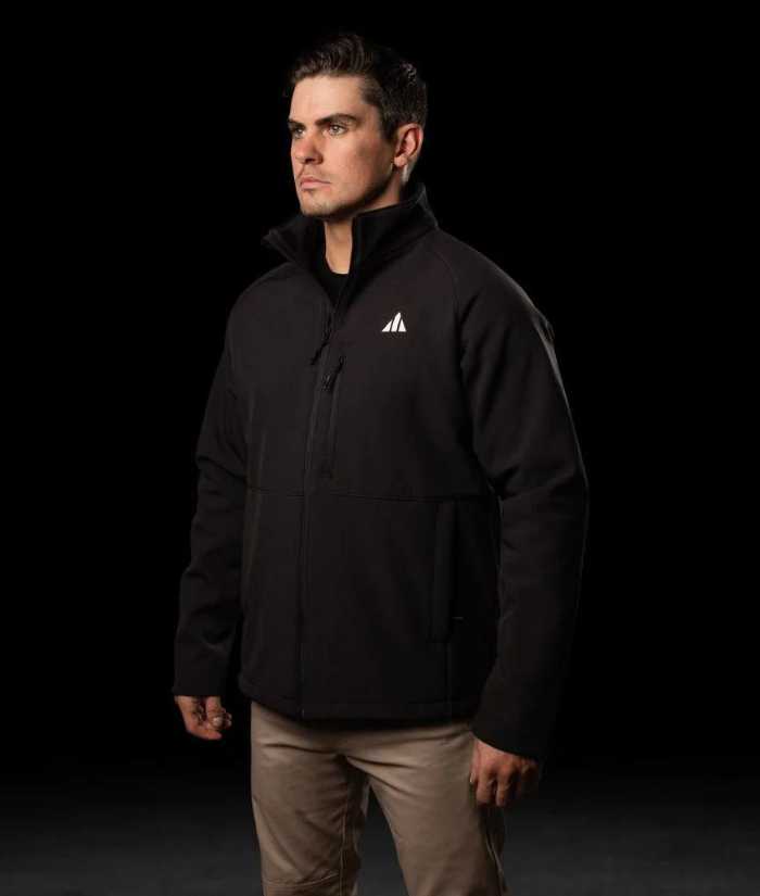 model-front-water-resistance-bad-apex-softshell-jacket-black-khaki-pants-black-tee